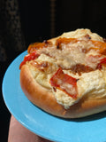 Roasted pepper, caramelised onion and pecorino bun